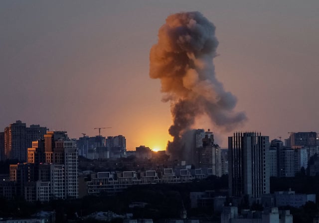 An explosion of a missile lights up the sky over the city during a Russian drone and missile strike, amid Russia's attack on Ukraine, in Kyiv, Ukraine June 23, 2025.