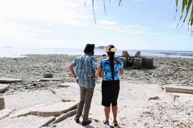 World Bank's president Ajay Banga views the impact of sea level rise in Funafuti, Tuvalu, September 6, 2024. Scientists say by 2050, half of Tuvalu's main town of Funafuti will be inundated by tides. A climate migration deal struck with Australia gives its population a pathway to move when the atoll nation becomes uninhabitable. REUTERS/Kirsty Needham/File Photo