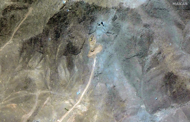 A satellite overview shows a closer view of excavators at tunnel entrances at the Fordow Fuel Enrichment Facility, amid the Iran-Israel conflict, near Qom, Iran, June 27, 2025. Maxar Technologies/Handout via REUTERS/File Photo