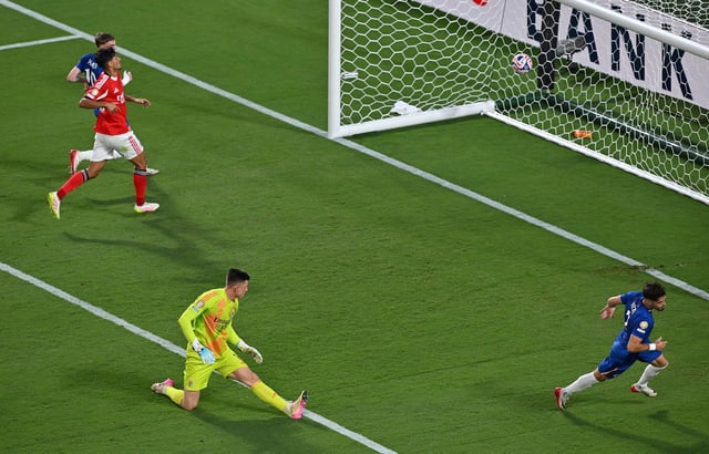 Chelsea winger Pedro Neto celebrates scoring his team's third goal.