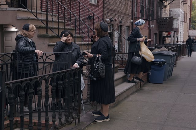 Hasidic Jewish women chat on Monday, June 16, 2025, in the Brooklyn borough of New York. (AP Photo/Andres Kudacki)