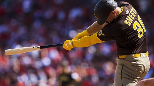 Jun 28, 2025; Cincinnati, Ohio, USA; San Diego Padres outfielder Gavin Sheets (30) hits a double in the second inning against the Cincinnati Reds at Great American Ball Park. Mandatory Credit: Katie Stratman-Imagn Images
