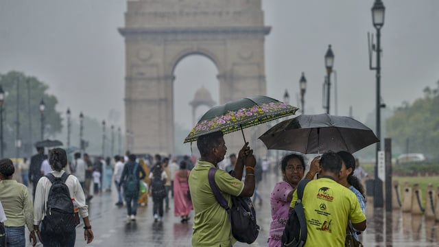 New Delhi: People visit Kartavya Path amid rain, in New Delhi, Sunday, June 29, 2025. 