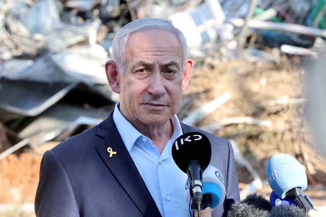 Israel's Prime Minister Benjamin Netanyahu gives a statement during a visit to the site of the Weizmann Institute of Science, which was hit by an Iranian missile barrage, in the central city of Rehovot, Israel June 20, 2025.     JACK GUEZ/Pool via REUTERS/File Photo