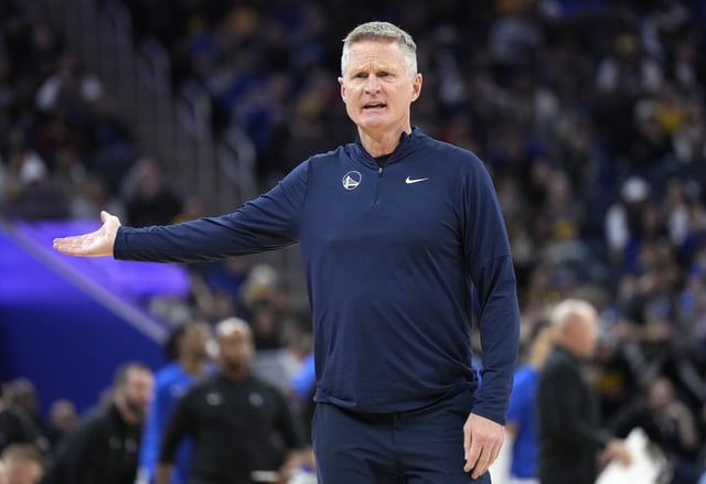 Head coach Steve Kerr of the Golden State Warriors reacts complaining to the officials a no foul call on his player Stephen Curry #30 against the Dallas Mavericks during third quarter at Chase Center on December 30, 2023 in San Francisco, California.