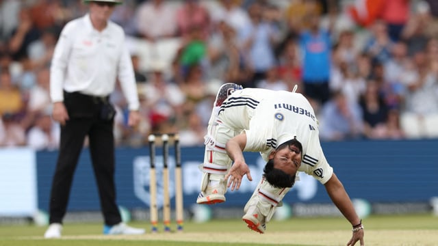 India's Rishabh Pant celebrates reaching his century.