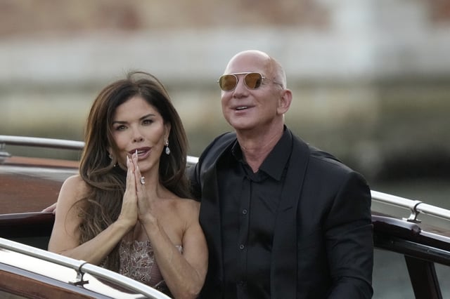 Lauren Sanchez Bezos, left, and Jeff Bezos depart from the Aman hotel during wedding celebrations in Venice, Italy, Saturday, June 28, 2025. (AP Photo/)