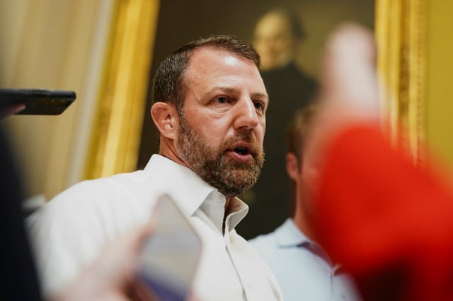 U.S. Senator Markwayne Mullin (R-OK) responds to questions from the media as Republican lawmakers struggle to pass U.S. President Donald Trump’s sweeping spending and tax bill, on Capitol Hill in Washington, D.C., U.S., June 28, 2025. REUTERS/Ken Cedeno/File Photo