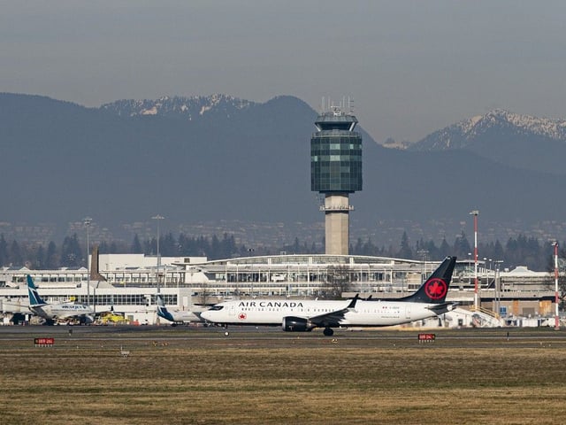 An Air Canada plane takes off at Vancouver International Airport.