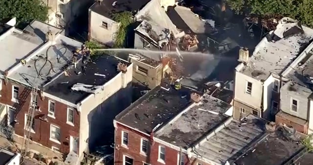 This aerial video image provided by WPVI shows firefighters working on the aftermath of an explosion in Philadelphia, Sunday, June 29, 2025. (WPVI-TV via AP)