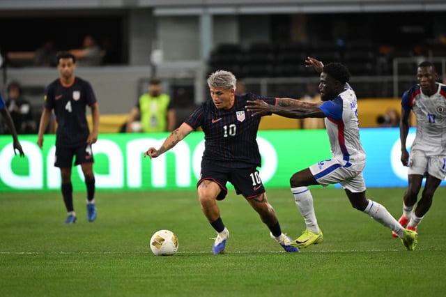 Diego Luna #10 of United States battles Carlens Arcus #2 of Haiti during the second half of the Gold Cup match between United States and Haiti at AT&amp;T Stadium on June 22, 2025 in Arlington, Texas. United States won the match 2-1