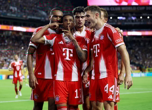 Bayern Munich forward Michael Olise (17) celebrates with teammates after scoring during a group stage match of the 2025 FIFA Club World Cup at Hard Rock Stadium.