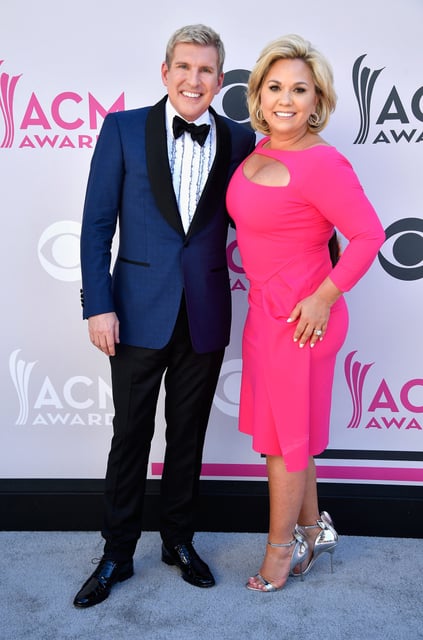 Todd Chrisley, left, and Julie Chrisley attend the 52nd Academy of Country Music Awards at Toshiba Plaza in Las Vegas on April 2, 2017.