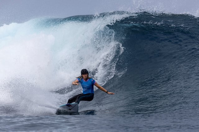 Paris 2024 Olympics - Surfing - Women's Round 2 - Heat 4 - Teahupo'o, Tahiti, French Polynesia - July 28, 2024. Molly Picklum of Australia rides a wave. Ed Sloane/Pool via REUTERS/File Photo