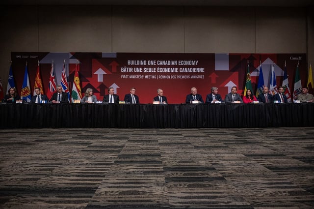 Prime Minister Mark Carney, centre, and the Premiers of Canada speak to media following the First Minister’s Meeting in Saskatoon, Sask., Monday, June 2, 2025. THE CANADIAN PRESS/Liam Richards