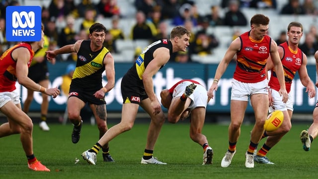Tom Lynch strikes Jordon Butts in the head
