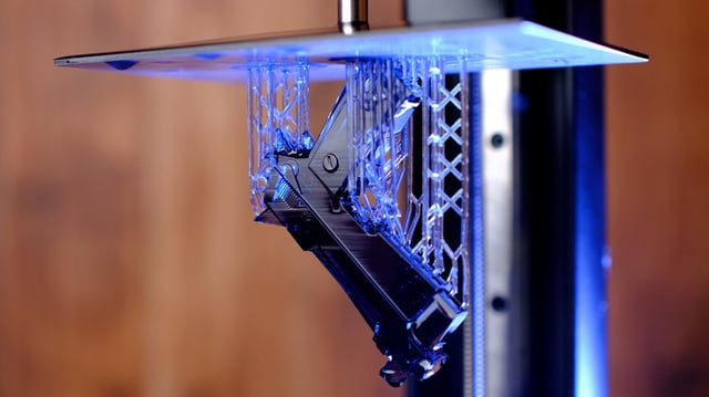 Building a gun on a 3D printer - stock photo.
