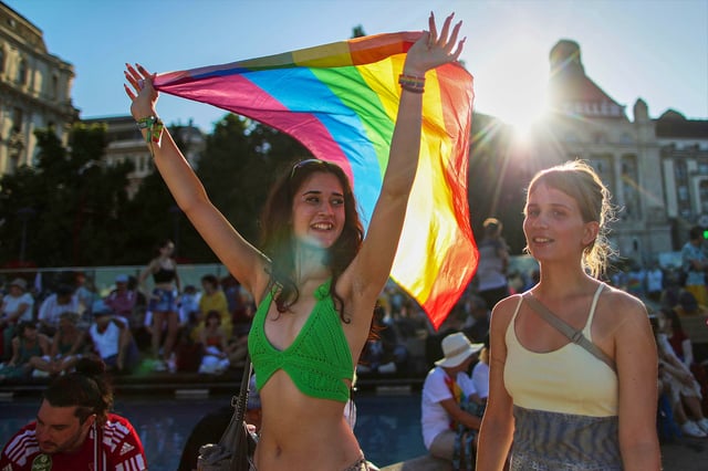 A girl holds a rainbow flag during the Pride march in Budapest, Hungary, Saturday, June 28, 2025. Photo AP Photo/ Rudolf Karancsi / Alamy