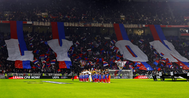 Soccer Football - Europa League - Olympique Lyonnais v Eintracht Frankfurt - Groupama Stadium, Lyon, France - December 12, 2024 General view as the teams line up with young mascots before the match REUTERS/Manon Cruz/File Photo