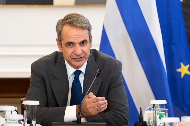 Greece's Prime Minister Kyriakos Mitsotakis addresses a ministerial cabinet meeting in Athens, Greece, Monday, June 30, 2025.(AP Photo/Petros Giannakouris)