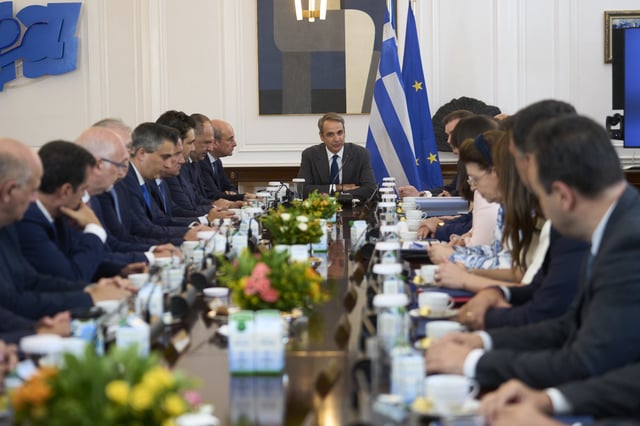 Greece's Prime Minister Kyriakos Mitsotakis addresses a ministerial cabinet meeting in Athens, Greece, Monday, June 30, 2025. (AP Photo/Petros Giannakouris)