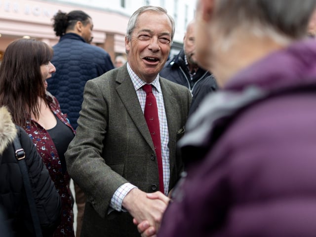 BERVERLEY, ENGLAND - APRIL 25: Leader of the Reform Party Nigel Farage meets and speaks with the public while on a walkabout on April 25, 2025 in Beverley, England. Luke Campbell is the Reform Party Candidate for Mayor of Hull and East Yorkshire, being contested on May 1st, 2025. (Photo by Ryan Jenkinson/Getty Images)