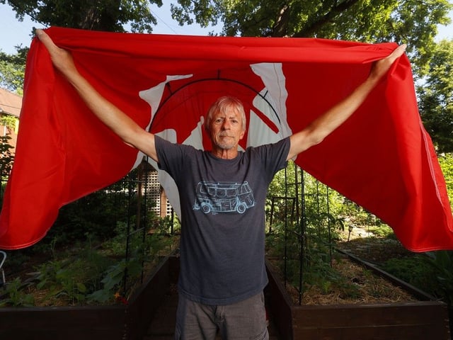 OTTAWA - June 24 2025 -- Stu Rathbone waited 14 years to receive his Canadian flag from the Peace Tower. It now takes more than 100 years to receive a Peace Tower flag, or any flag from Parliament Hill because the demand for the flag program is so strong.    TONY CALDWELL, Postmedia.