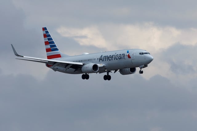 An American Airlines commercial aircraft approaches to land at John Wayne Airport in Santa Ana, California U.S. January 18, 2022.     REUTERS/Mike Blake/File Photo