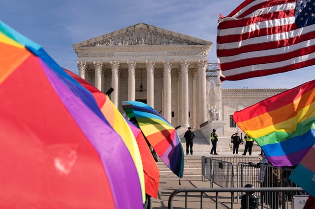 FILE - Transgenders rights supporters rally outside of the Supreme Court, Dec. 4, 2024, in Washington. (AP Photo/Jose Luis Magana, File)