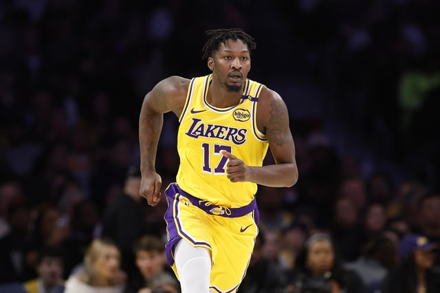 Dorian Finney-Smith #1 of the Los Angeles Lakers during the first half against the Cleveland Cavaliers at Crypto.com Arena on December 31, 2024 in Los Angeles, California.