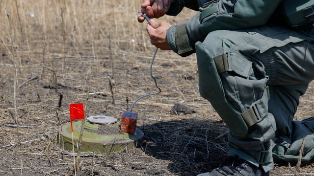 A soldier demining in the Donetsk region