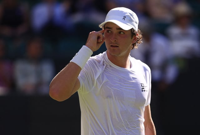 Tennis - Wimbledon - All England Lawn Tennis and Croquet Club, London, Britain - June 30, 2025 Brazil's Joao Fonseca celebrates winning his first round match against Britain's Jacob Fearnley REUTERS/Andrew Couldridge