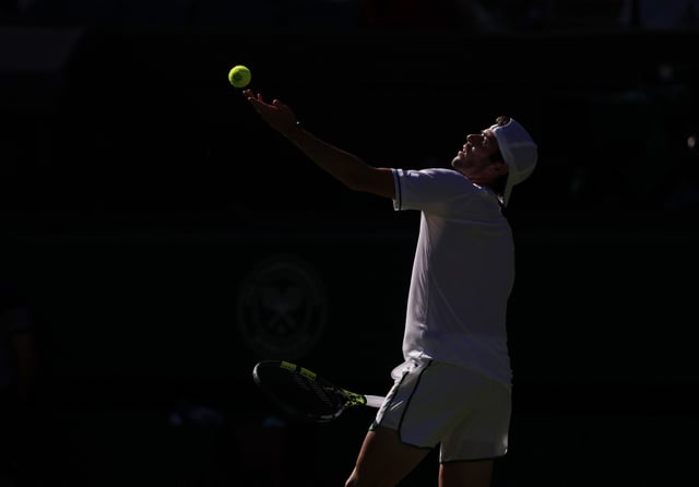 Tennis - Wimbledon - All England Lawn Tennis and Croquet Club, London, Britain - June 30, 2025 Britain's Jacob Fearnley in action during his first round match against Brazil's Joao Fonseca REUTERS/Andrew Couldridge