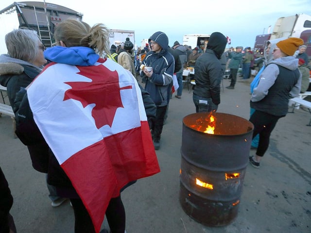 Protesters at the road block on Highway 4 outside of Milk River heading towards the Coutts border crossing on Tuesday, February 8, 2022. 