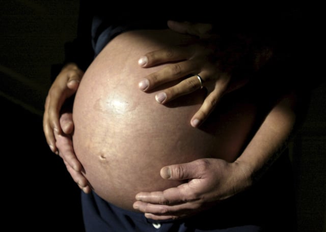 This Nov. 2005 file photo shows future parents awaiting the arrival of their first child in Carlsbad, Calif. When you're expecting a baby, you hope nothing goes wrong. But at least one in 20 pregnant patients develops a scary complication called preeclampsia, a high blood pressure disorder that kills 70,000 women and 500,000 babies worldwide every year. New blood tests promise to help doctors predict and manage the condition. (AP Photo/Julie Busch, file)