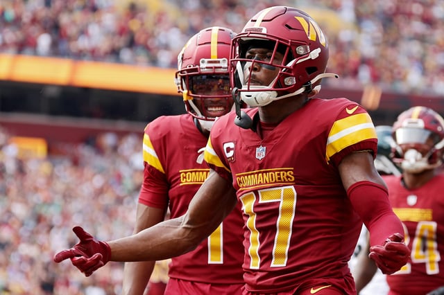 Terry McLaurin #17 of the Washington Commanders celebrates a touchdown in the first quarter of a game against the Philadelphia Eagles at FedExField on October 29, 2023 in Landover, Maryland.