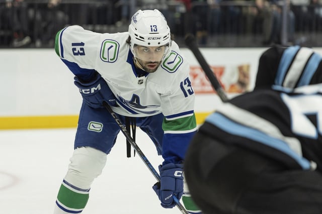 Arshdeep Bains stands on the ice during the face-off against Utah Hockey Club during the second period of an NHL hockey game, Sunday, Feb. 23, 2025, in Salt Lake City. (AP Photo/Melissa Majchrzak)