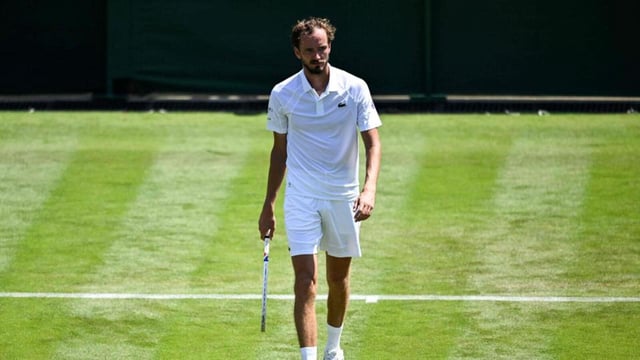 Daniil Medvedev is out of another Grand Slam tournament in the first round after losing to 64th-ranked Benjamin Bonzi 7-6 (2), 3-6, 7-6 (3), 6-2 at Wimbledon. (AFP)