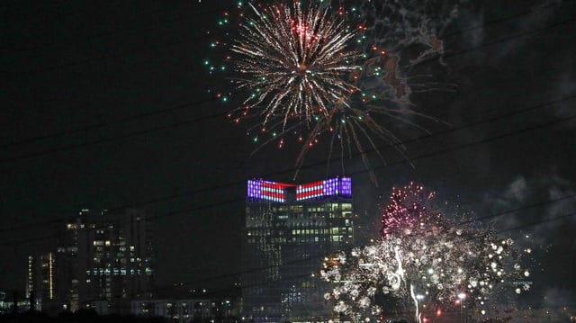 Fireworks light the night sky during the beginning moments of the Fourth of July fireworks display in Fort Worth, Texas, Monday, July 4, 2022. A few minutes in, the show was canceled due to grass fires.