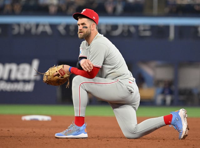 Jun 4, 2025; Toronto, Ontario, CAN;  Philadelphia Phillies first baseman Bryce Harper (3) looks on during an injury delay in the ninth inning against the Toronto Blue Jays at Rogers Centre. Mandatory Credit: Dan Hamilton-Imagn Images/File Photo