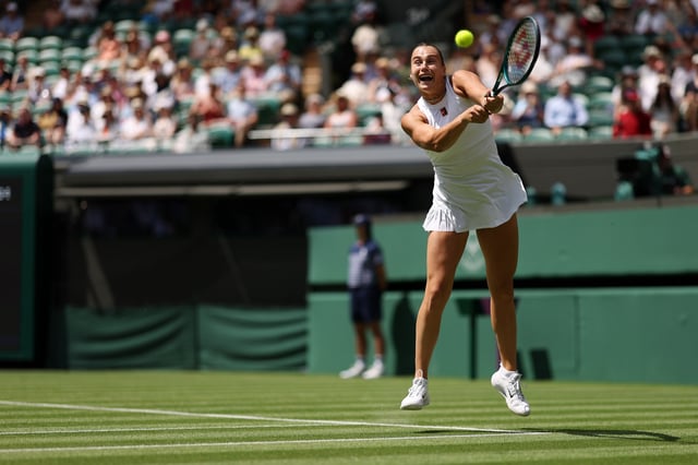 Jun 30, 2025; Wimbledon, United Kingdom; Aryna Sabalenka hits a backhand against Carson Branstine (CAN) (not pictured) on day one of The Championships, Wimbledon 2025 at All England Lawn Tennis and Croquet Club. Mandatory Credit: Geoff Burke-Imagn Images