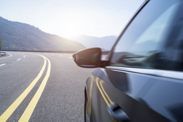 A car is running on the motorway