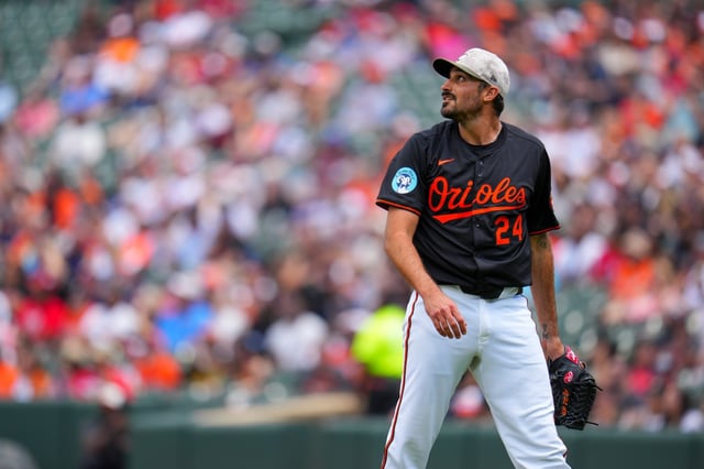 Baltimore Orioles starting pitcher Zach Eflin watches a three-run home run by Washington Nationals&#39; Dylan Crews leave the ballpark during the second inning of a baseball game Sunday, May 18, 2025, in Baltimore. (AP Photo/Julio Cortez)