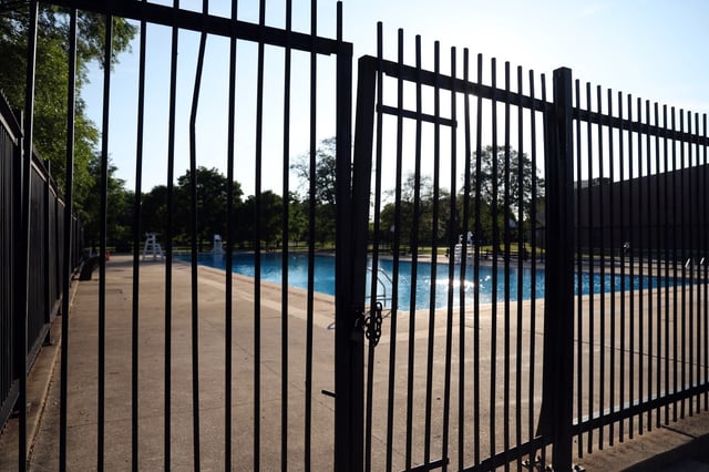 The pool at Douglass Park in Chicago is closed on June 27, 2025, after teens were shot nearby, one fatally. (Terrence Antonio James/Chicago Tribune)