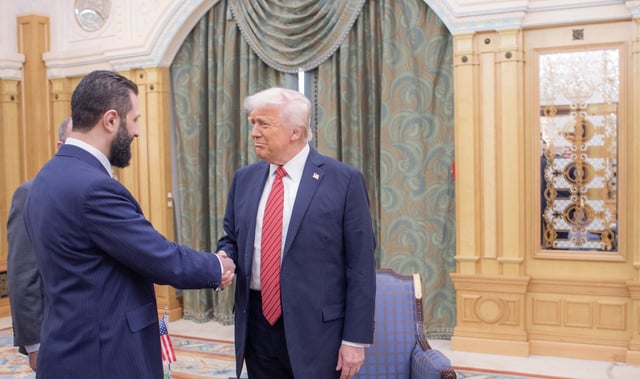 RIYADH, SAUDI ARABIA - MAY 14: (----EDITORIAL USE ONLY - MANDATORY CREDIT - 'BANDAR AL-JALOUD / SAUDI ROYAL COURT / HANDOUT' - NO MARKETING NO ADVERTISING CAMPAIGNS - DISTRIBUTED AS A SERVICE TO CLIENTS----) US President Donald Trump (C) meets with Syrian President Ahmed al-Shara (L) along with the Saudi Crown Prince Mohammed bin Salman Al Saud (R) during the first leg of his three-country Middle East tour in Riyadh, Saudi Arabia on May 14, 2025. (Photo by Bandar Al-Jaloud/Saudi Royal Court/Handout/Anadolu via Getty Images)