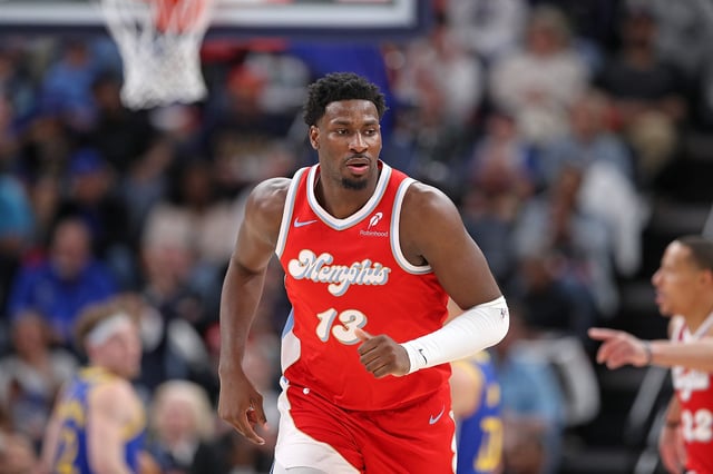 Jaren Jackson Jr. #13 of the Memphis Grizzlies runs up the court during the game against the Golden State Warriors at FedExForum on April 01, 2025 in Memphis, Tennessee.