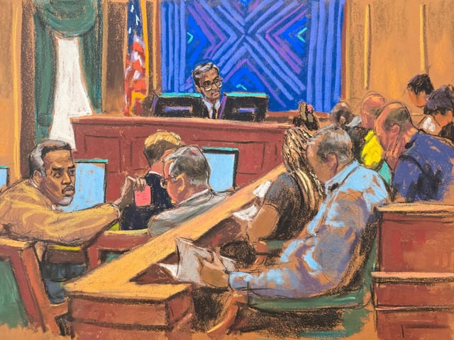 Sean "Diddy" Combs passes a note to his attorney Marc Agnifilo as U.S. District Judge Arun Subramanian gives legal instructions to the jury, during Combs' sex trafficking trial in New York City on June 30, 2025 in this courtroom sketch.

 