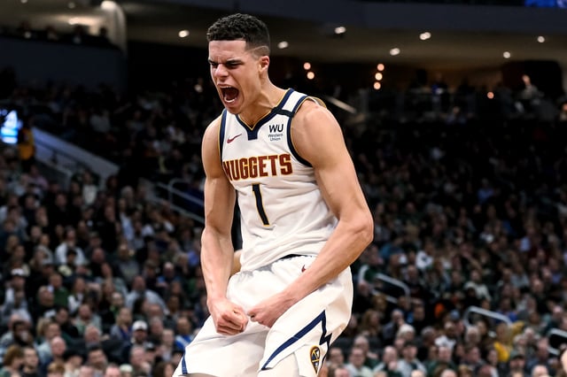 Michael Porter Jr. #1 of the Denver Nuggets celebrates in the third quarter against the Milwaukee Bucks at the Fiserv Forum on January 31, 2020 in Milwaukee, Wisconsin.