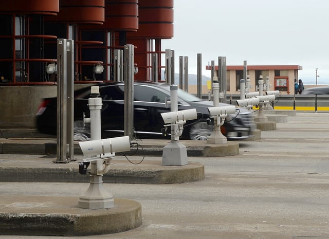 A car passes through the Golden Gate Bridge toll plaza on June 27, 2022. (Alan Dep/Marin Independent Journal)