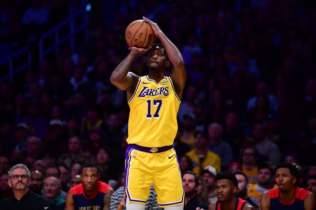 Mar 4, 2025; Los Angeles, California, USA; Los Angeles Lakers forward Dorian Finney-Smith (17) shoots against the New Orleans Pelicans during the first half at Crypto.com Arena. Mandatory Credit: Gary A. Vasquez-Imagn Images/File Photo